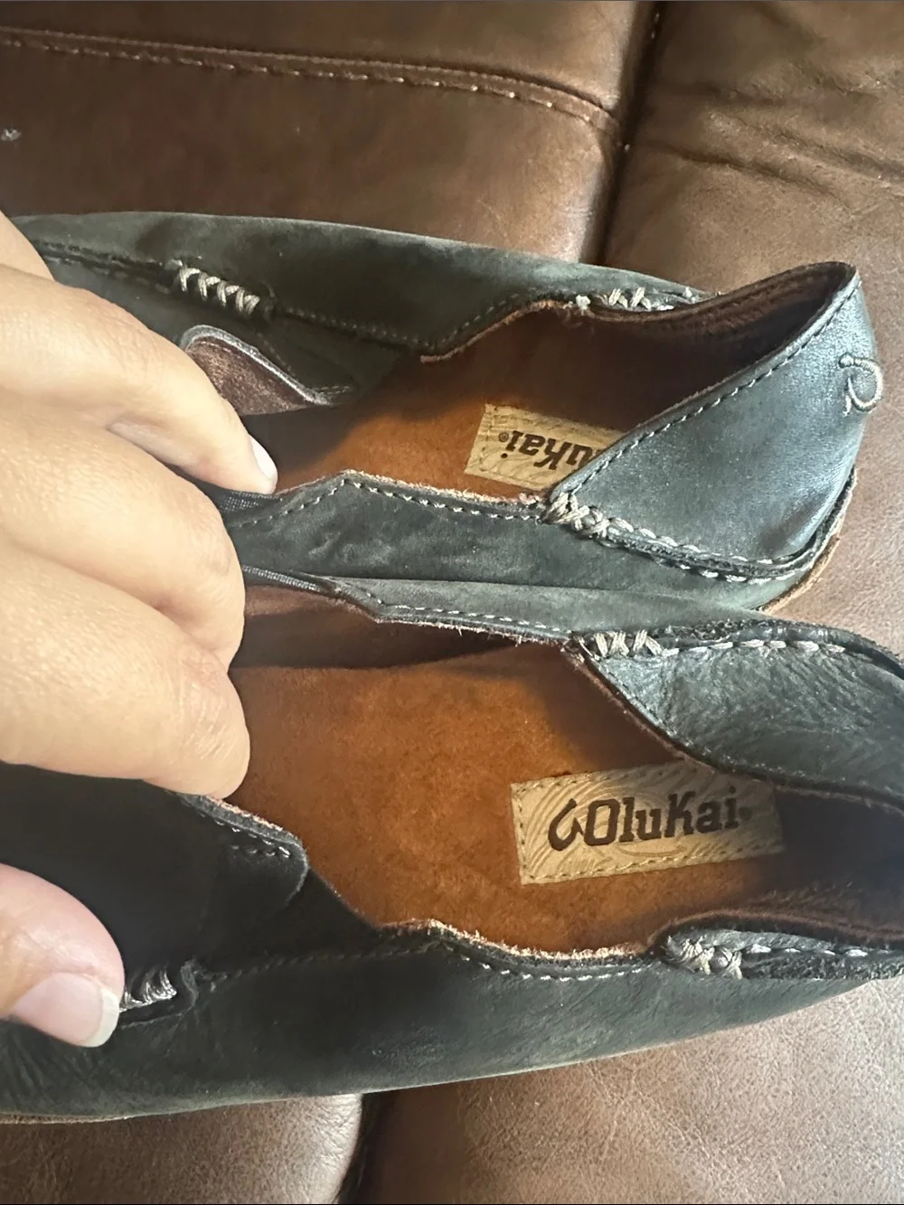 OluKai Men's Black Slip-On Loafers with Brown Trim